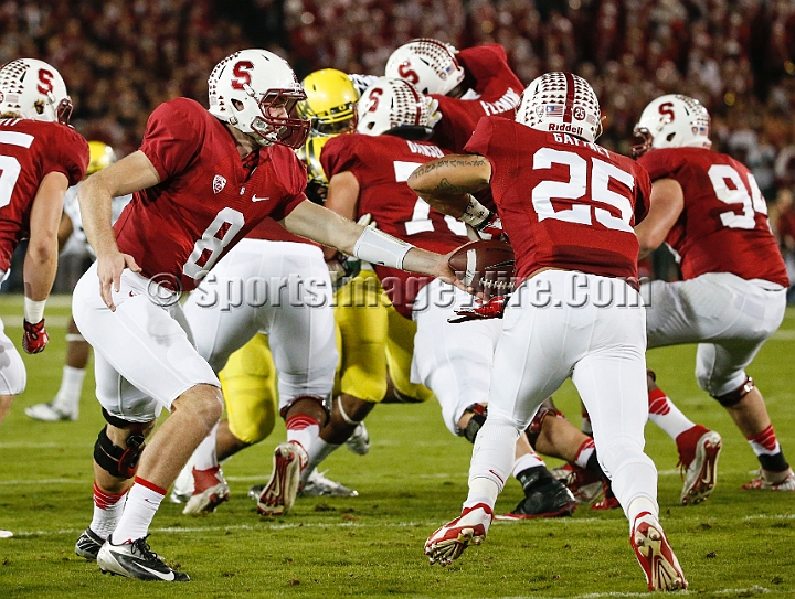 2013-Stanford-Oregon-020.JPG - Nov. 7, 2013; Stanford, CA, USA; Stanford Cardinal quarterback Kevin Hogan (8) hands off to running back Tyler Gaffney (25) against the Oregon Ducks at Stanford Stadium.  Gaffney carried the ball a school record 45 times during the game. Stanford defeated Oregon 26-20.